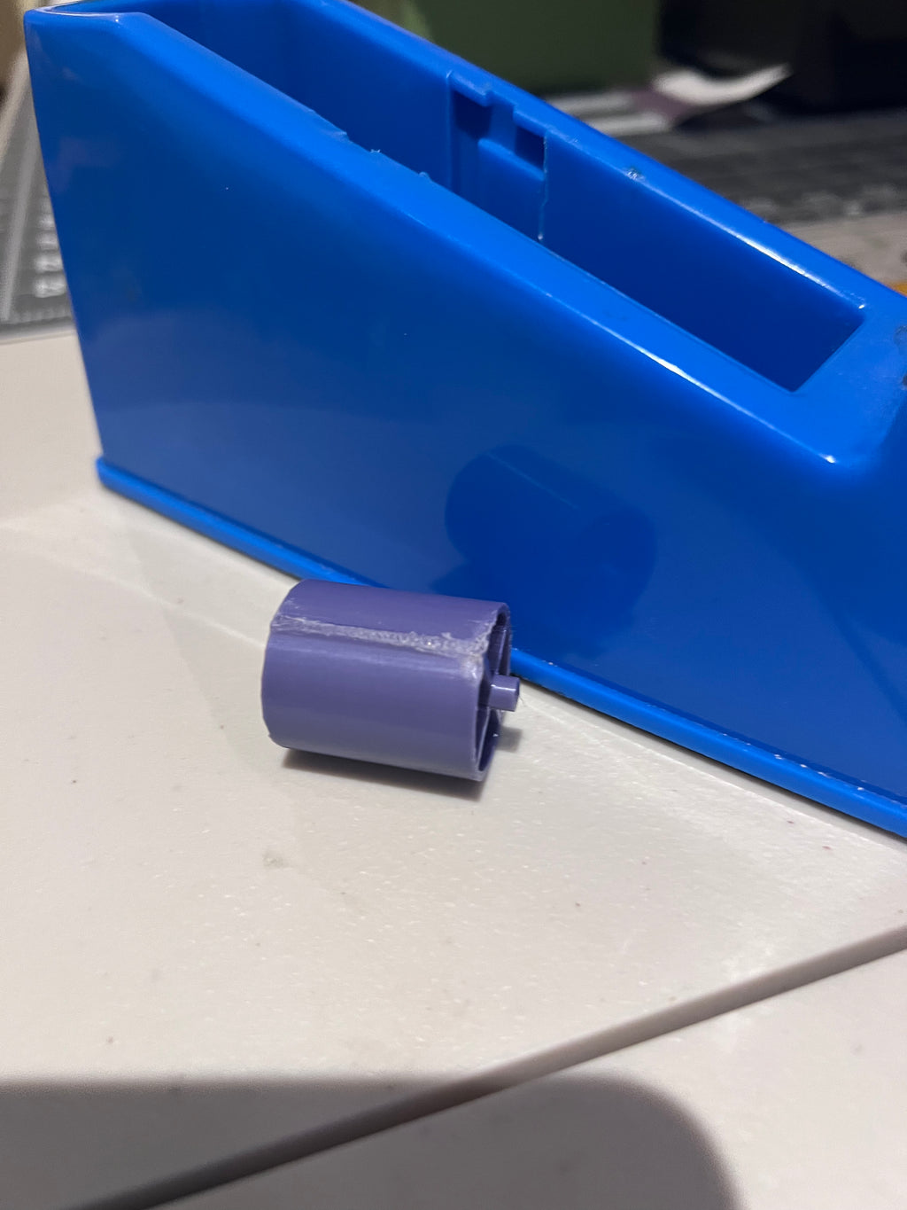 3D printed replacement roller for HTVRONT tape dispenser.